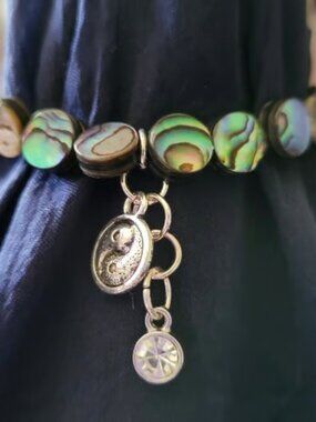Pearlized Green Beaded Bracelet with Charms